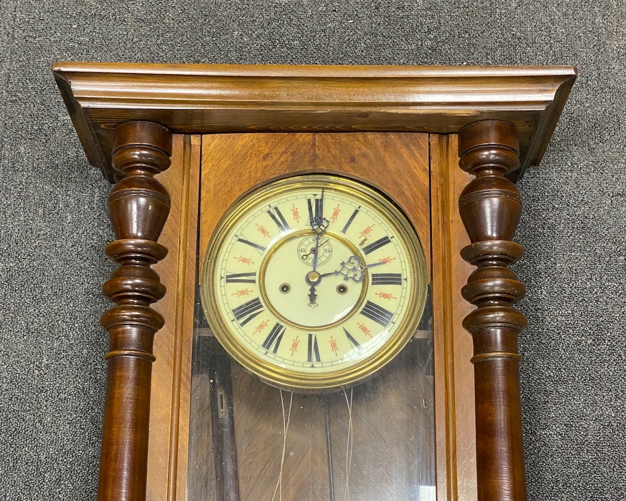 An early 20th century walnut and beech Vienna regulator wall clock, height 112cm